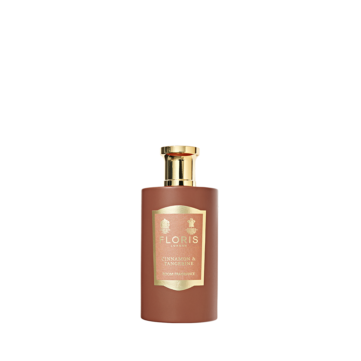 A bottle of Floris London Cinnamon & Tangerine Room Fragrance with a gold cap and label, featuring a rich spice blend of amber sandalwood.