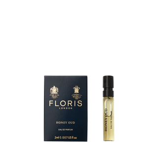 A 2ml sample of Floris London's Honey Oud eau de parfum has a black box on the left and a small vial on the right.