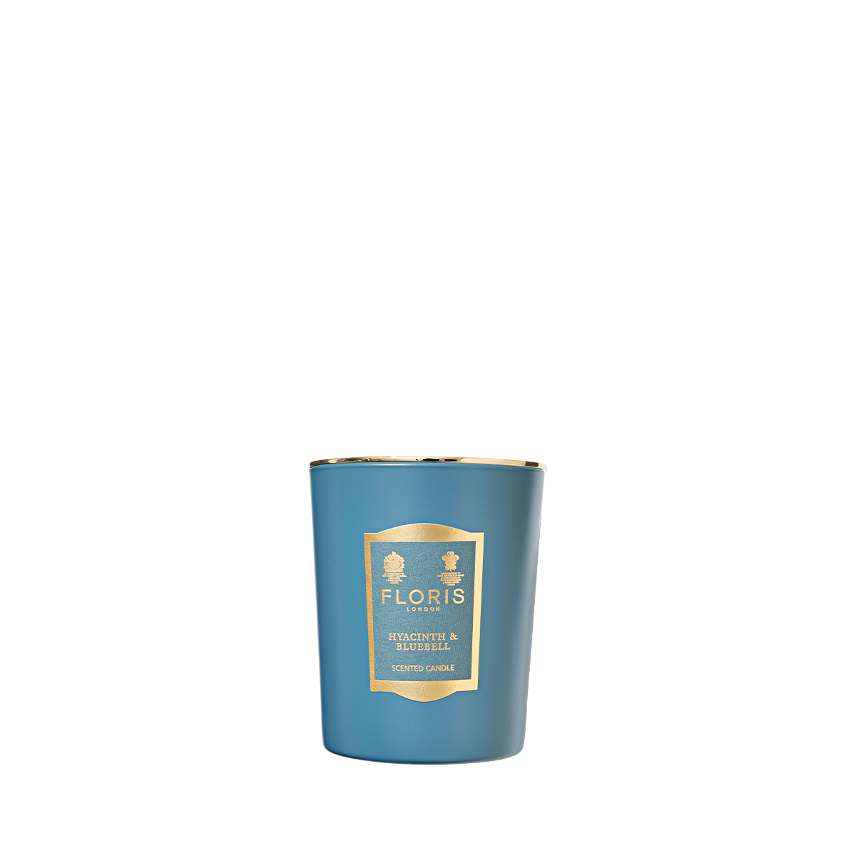 Floris London's "Hyacinth & Bluebell" 175g candle, with gold accents, delivers a refreshing green floral fragrance for a richly scented atmosphere.