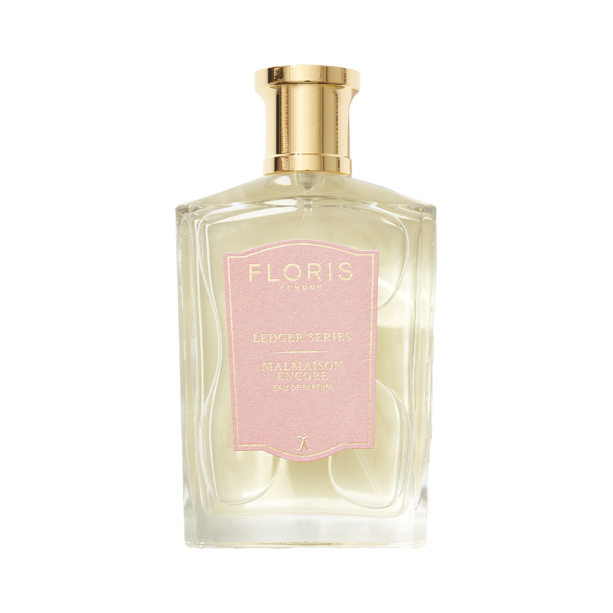 Clear perfume bottle with gold cap and pink label reading "Floris London UK, Malmaison Encore," exuding captivating allure.