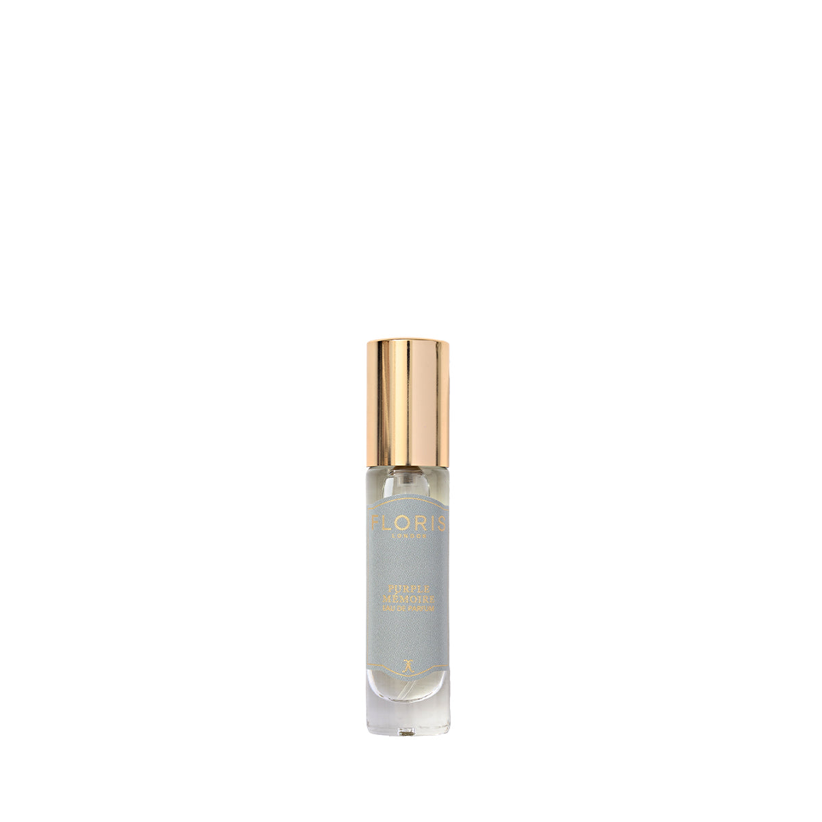 Clear glass perfume bottle with a gold cap, labeled "Floris London UK," holds the sophisticated scent of Purple Mémoire - Eau de Parfum.