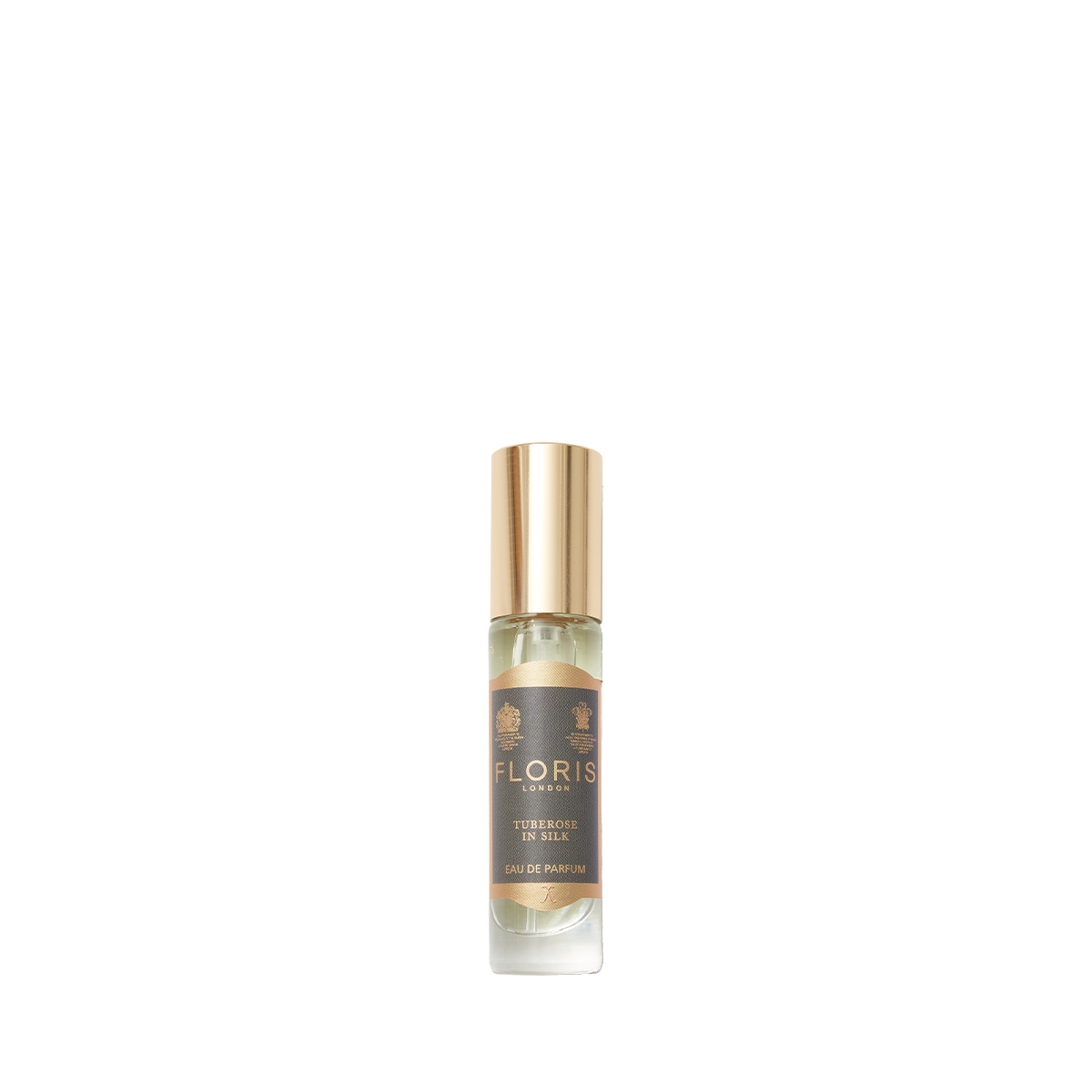 A small bottle of Floris London's "Tuberose in Silk" Eau de Parfum with a golden cap and beige-dominant label exudes rich jasmine notes.