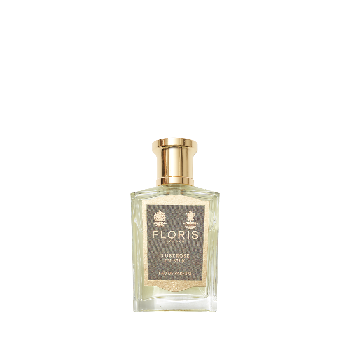 Perfume bottle labeled "Tuberose in Silk - Eau de Parfum" by Floris London, featuring a gold cap and exuding jasmine hints.