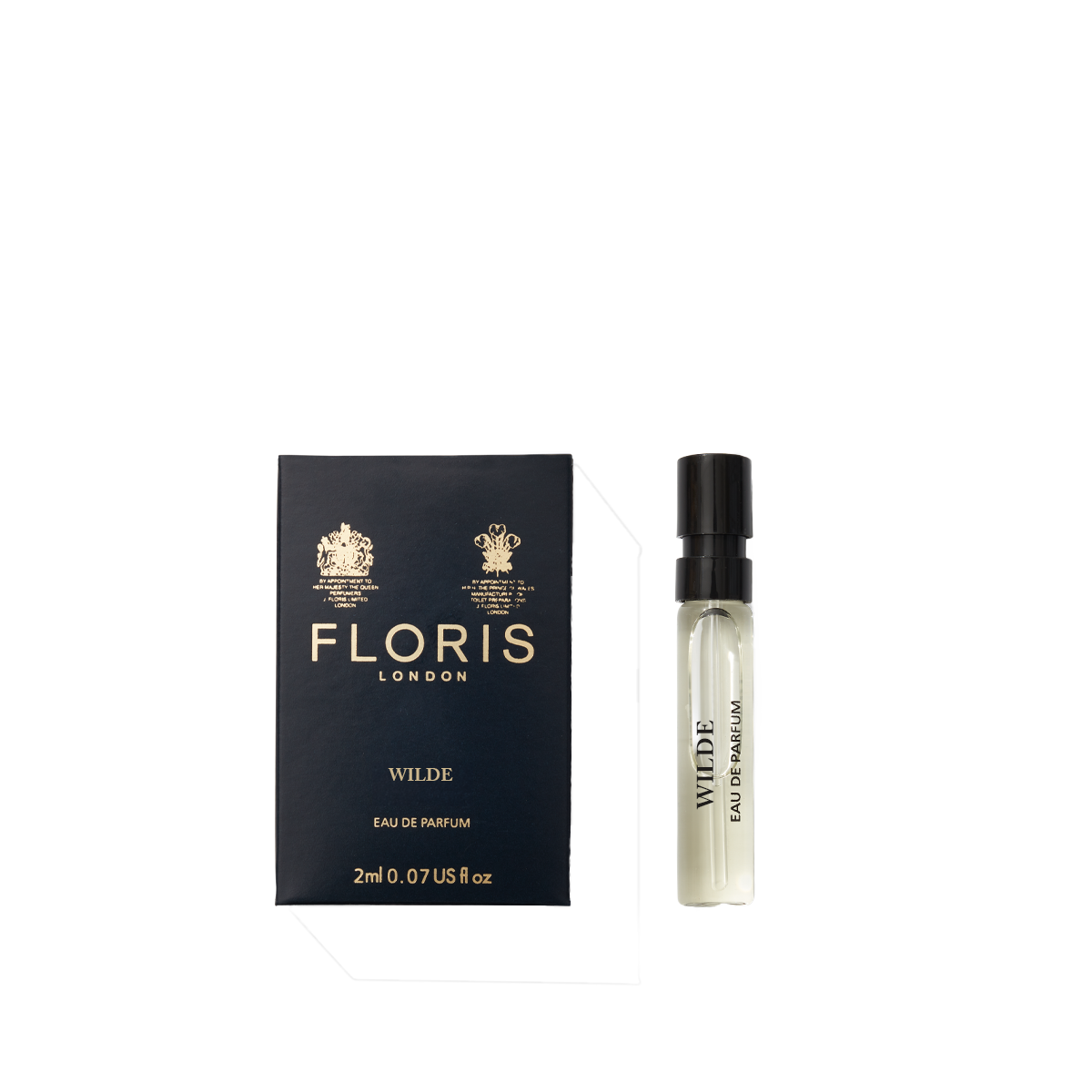 A deep blue box of Floris London Wilde - Eau de Parfum sits beside a small clear spray vial, representing freedom and individuality.