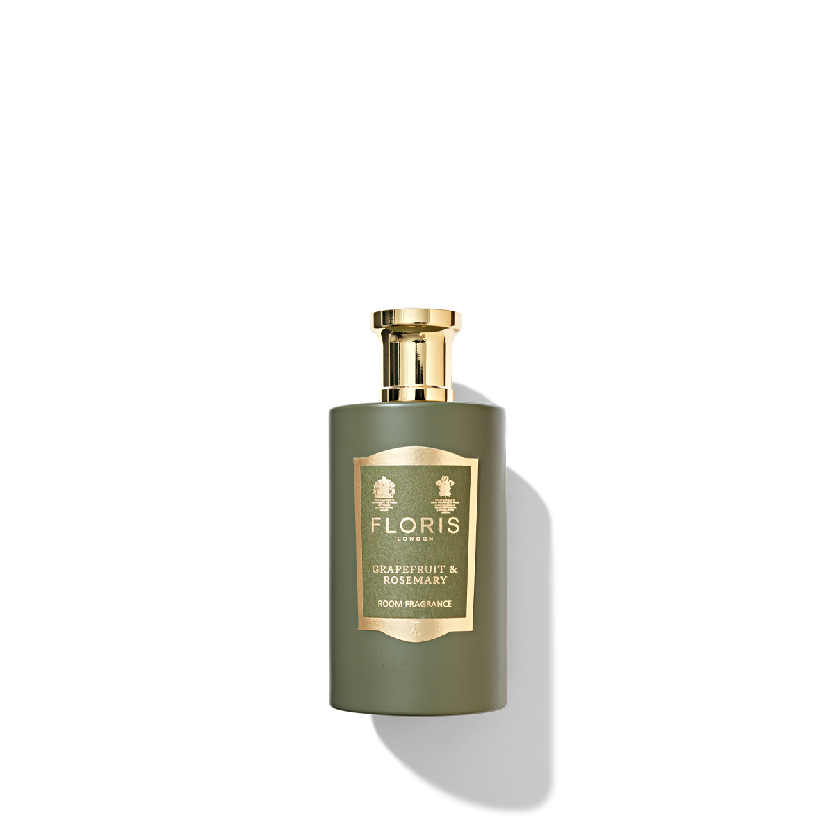 Green and gold room fragrance bottle for Grapefruit & Rosemary scent