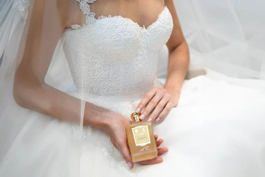 Bride holding customised perfume bottle