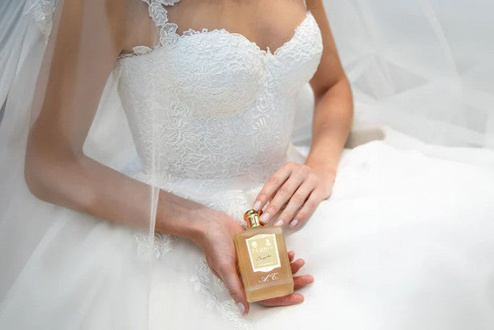Bride holding customised perfume bottle