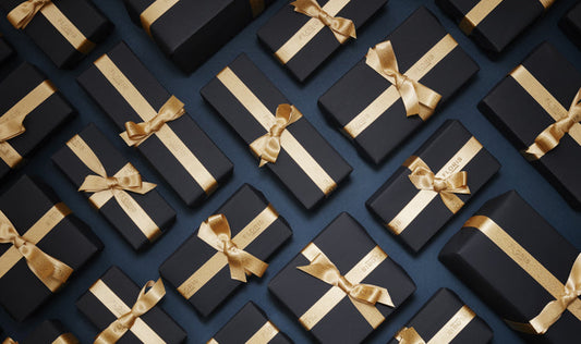Blue gift boxes with golden ribbon