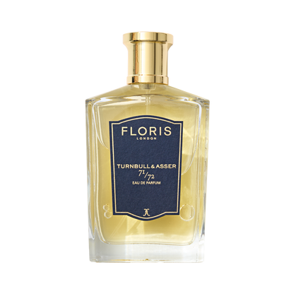 A bottle of Floris London 71/72 Eau de Parfum with a vegan formula, featuring a gold cap and navy label.