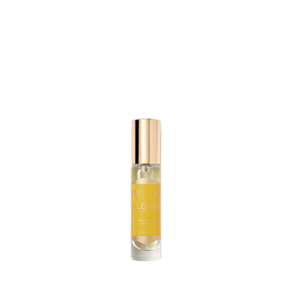 Clear glass bottle with a gold cap and a yellow label reads "Floris London," exuding an elegant fragrance of orange blossom. Product: Bergamotto di Positano.