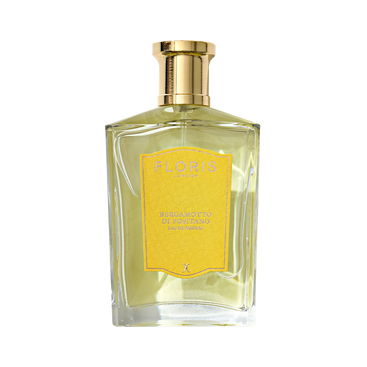 Clear glass bottle of Floris London's Bergamotto di Positano - Eau de Parfum with a gold cap, yellow label, and a hint of bergamot essence.