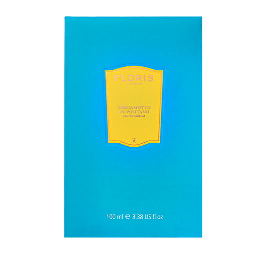 A blue perfume box with a yellow label reads "Floris London, Bergamotto di Positano - Eau de Parfum, 100 ml," featuring bergamot and orange blossom.