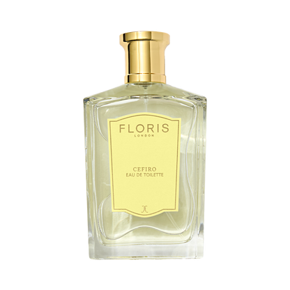 A clear glass bottle of Floris London Cefiro - Eau de Toilette with a gold cap and pale yellow label; a fresh, unisex citrus fragrance.