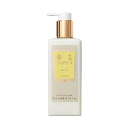 A 250ml Floris London Cefiro Luxury Hand Lotion with pump, gold cap, contains sweet almond oil. Ideal for nourishing dry skin, elegantly in yellow.
