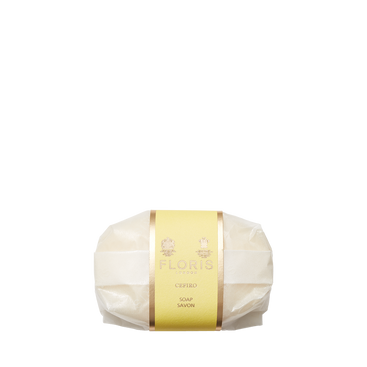 A bar of Floris London Cefiro Soap in yellow and white packaging, enriched with shea butter for a creamy lather.