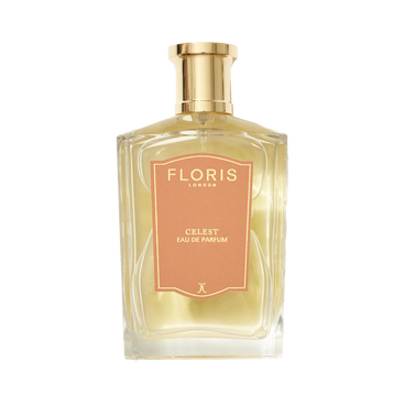 A clear glass bottle of Floris London UK Celest - Eau de Parfum with a gold cap and peach label, filled with light yellow perfume, on a white background.
