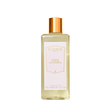 A clear bottle of Floris London UK Cherry Blossom - Bath & Shower Gel with a gold cap is shown on a white background.