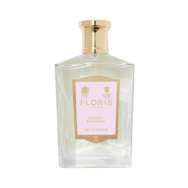 Floris London's Cherry Blossom Eau de Parfum, in a clear glass bottle with a gold cap and pink label, exudes luxury and elegance.