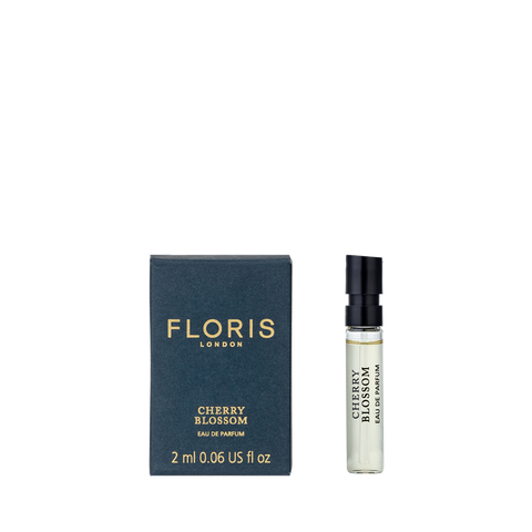 A 2ml Floris London Cherry Blossom - Eau de Parfum sample vial stands by its box, highlighting this elegant sakura-inspired floral fragrance.