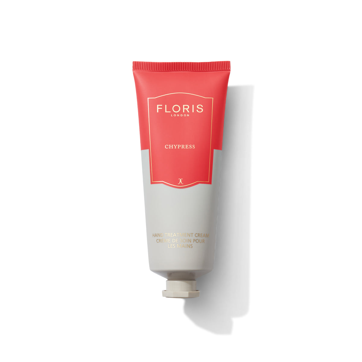 Red tube of hand treatment cream by floris