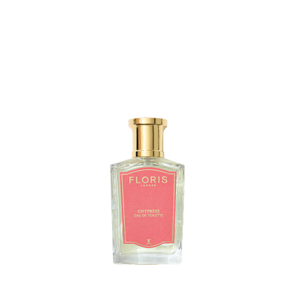 A bottle of Floris London's Chypress - Eau de Toilette with a pink label and gold cap, featuring floral chypre notes.