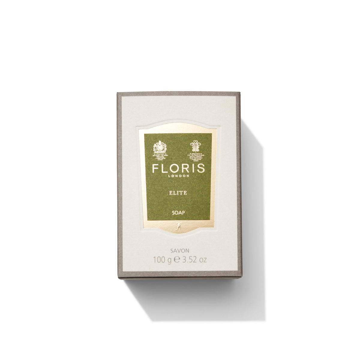 A rectangular box of Floris London's Elite Soap, 100g (3.52 oz), with a green and gold label on the front, features woody notes and a citrus twist.