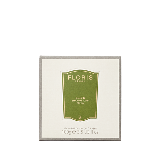 Floris London Elite - Shaving Bowl Refill 100g comes in a square white and gray box, featuring woody notes for a refined grooming experience.