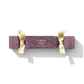 Red cracker with golden ribbon wrapped around it, the cracker says Cherry Blossom on it