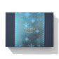 A blue box with sleeve on, it has holiday cracker collection on it