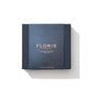 A blue box with blue sleeve, it has Perfumer's Trilogy For Him written on it.