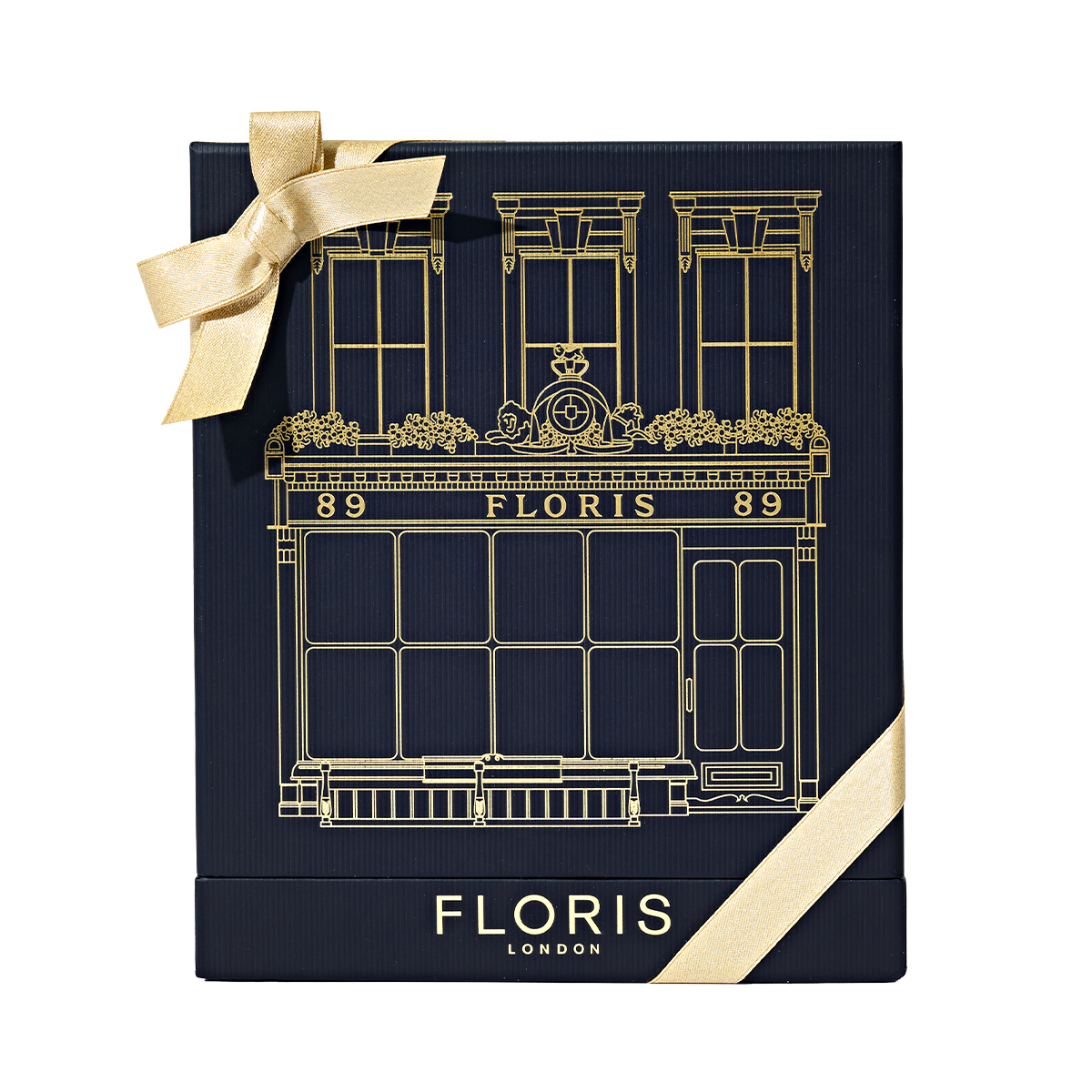 Navy blue Floris London UK Sweet Lux | Honey Oud Duo gift box with gold illustration, a gold bow, and luxurious Honey Oud Eau de Parfum inside.