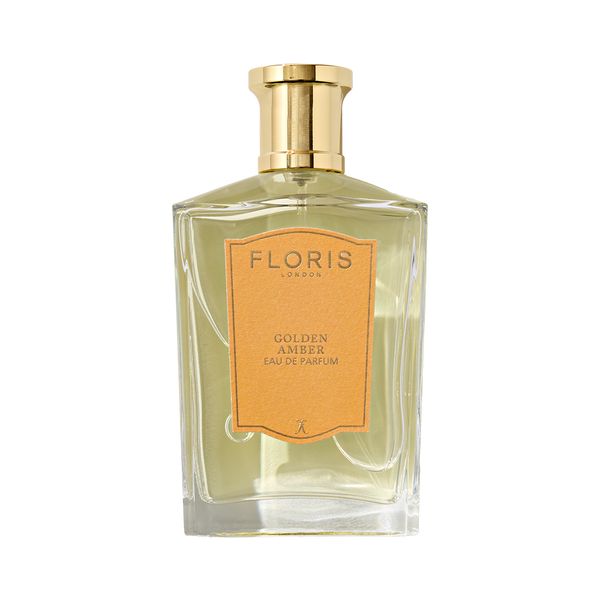 A vegan Floris London "Golden Amber - Eau de Parfum" with a gold cap and amber label.