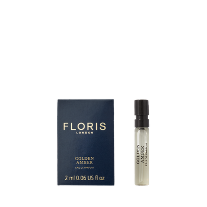 Floris London's 2ml Golden Amber - Eau de Parfum is vegan, comes in a stylish blue box, and features a convenient spray bottle.