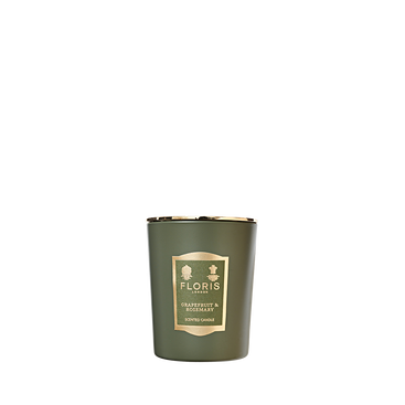 Floris London's "Grapefruit & Rosemary" candle, featuring pure fragrance oils, comes in white with a gold rim for a delightful aroma.