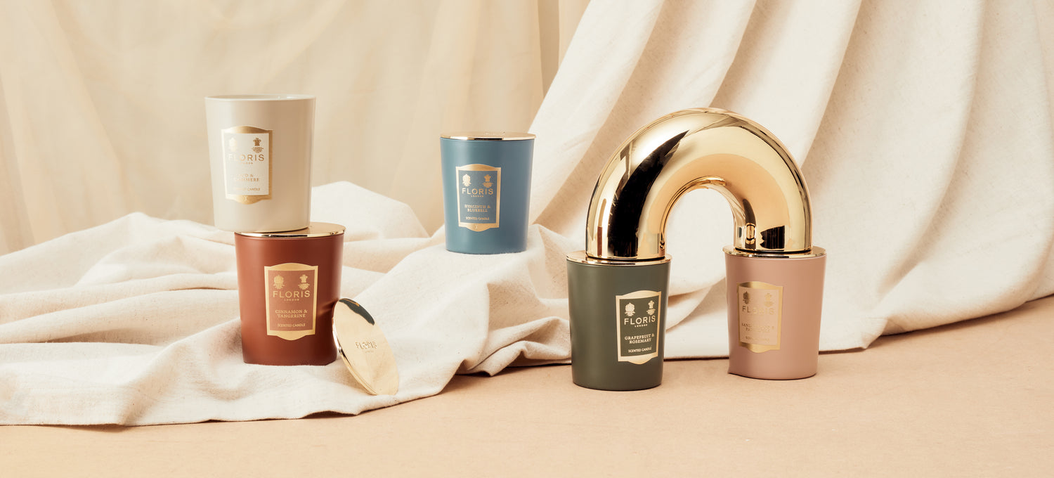 Floris London Candle Collection shown on a white sheet 