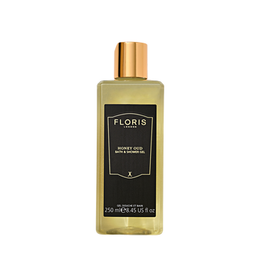 Clear 250ml bottle of Floris London UK Honey Oud Bath & Shower Gel with English honey, oud oil, black label, and gold cap.