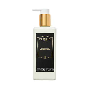 A 250ml white pump bottle of Floris London UK Honey Oud Body Moisturiser, enriched with English honey and oud oil, with a gold and black label.