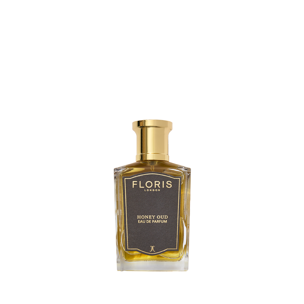 Clear glass bottle of Floris London Honey Oud Eau de Parfum with a gold cap, featuring a black label and infused with English honey notes.