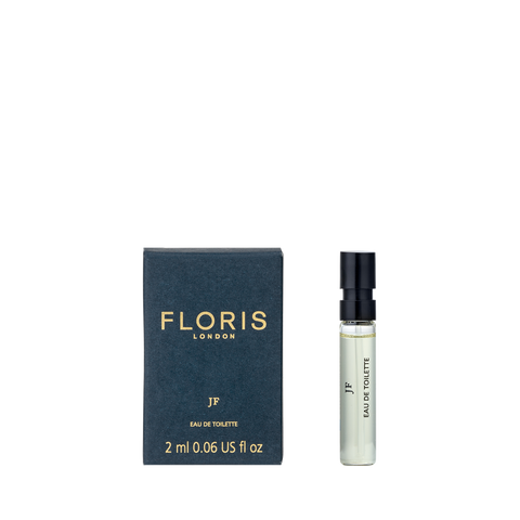 A Floris London JF - Eau de Toilette 2ml sample: dark box on the left, clear spray vial with black cap on the right.