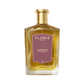 A bottle of Floris London's Leather Oud Eau de Parfum, featuring a gold cap and brown label, enhanced with oud oil.