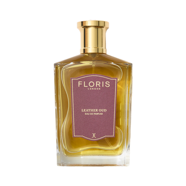 A bottle of Floris London's Leather Oud Eau de Parfum, featuring a gold cap and brown label, enhanced with oud oil.