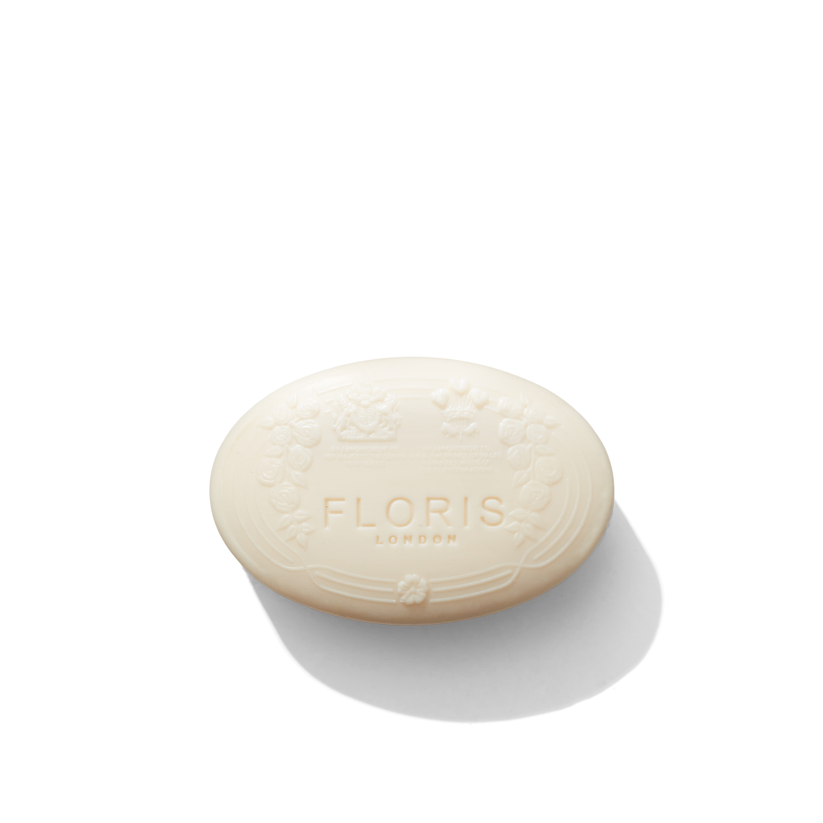one white soap with floris london logo embossed lily