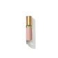 A small perfume bottle with a gold cap and a pink label that reads "Floris London" on a white background, exuding the essence of floral fragrance with hints of Lily of the Valley, named "Lily - Eau de Toilette.