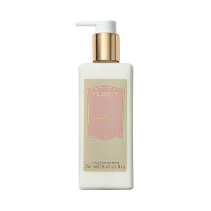 A 250ml bottle of Floris London Lily Luxury Hand Lotion with a pump, infused with vitamin E and featuring a pink label.