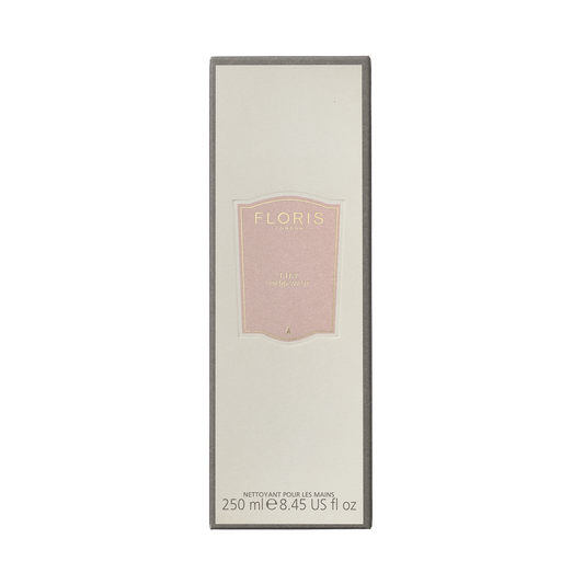 Cream-colored box labeled "Floris London," featuring a pink emblem and text indicating "Lily - Luxury Hand Wash 250ml.