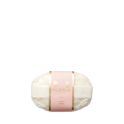 Floris London Lily Soap: Wrapped hand soap with pink label, gold accents, "Lily" and "Soap Savon" text, enriched with shea butter for a luxurious feel.