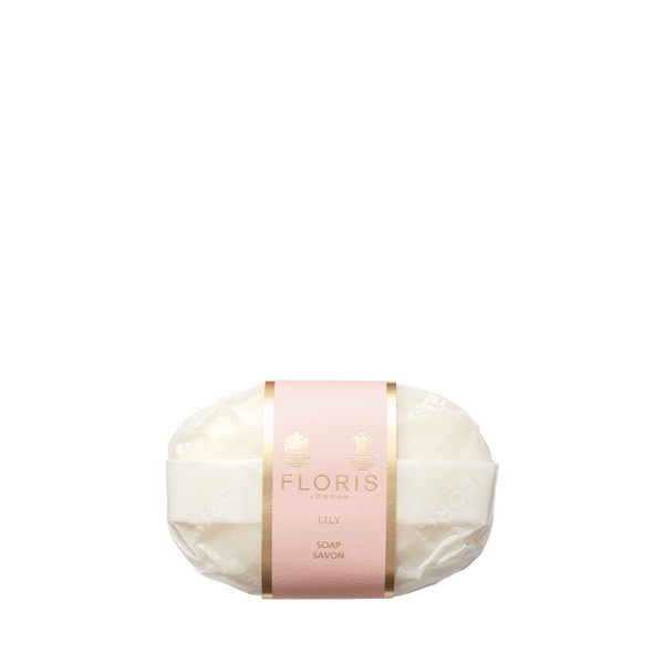 The Floris London Lily - Luxury Soap is a gentle, vegetable-based white bar wrapped in clear plastic with a pink and gold label.