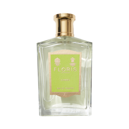 A bottle of Floris London's Limes Eau de Toilette has a gold cap and green label, offering vibrant citrus fragrance with hints of lemon zest.