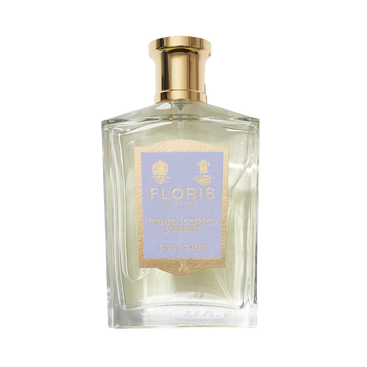 Perfume bottle with a gold cap and purple label reads "Floris London Night Scented Jasmine - Eau de Toilette," inspired by Minorca's enchanting nights.