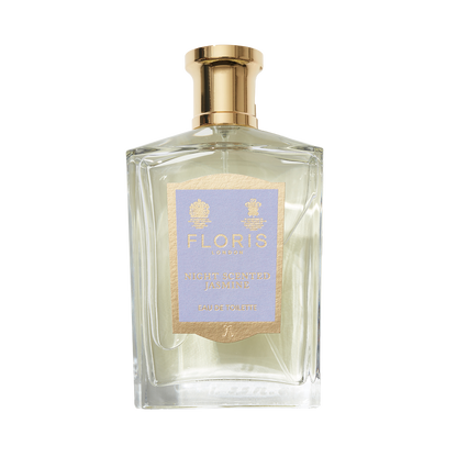 Perfume bottle with a gold cap and purple label reads "Floris London Night Scented Jasmine - Eau de Toilette," inspired by Minorca's enchanting nights.